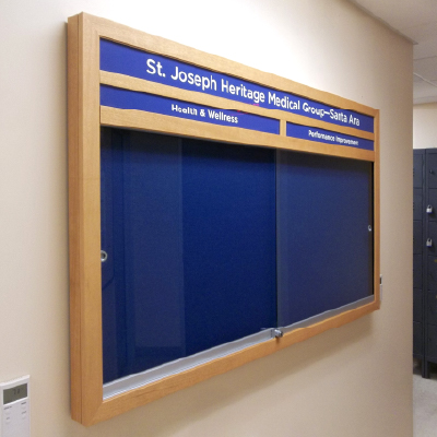 BBC210 Multiple Sliding Door Enclosed Bulletin Board with Header